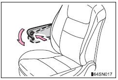 Toyota Sienna. Adjusting the front seat armrests