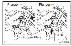 REMOVE NO. 1 CHAIN TENSIONER ASSEMBLY