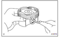 REMOVE PISTON SUB-ASSEMBLY WITH PIN