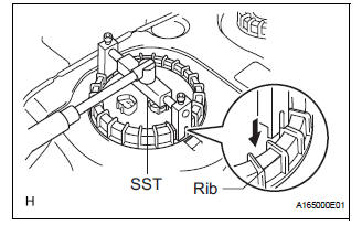 REMOVE FUEL SUCTION TUBE ASSEMBLY WITH PUMP AND GAUGE