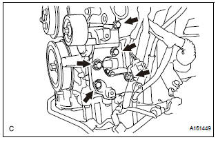 REMOVE V-RIBBED BELT TENSIONER ASSEMBLY