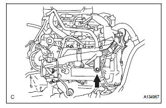 REMOVE NO. 1 SURGE TANK STAY