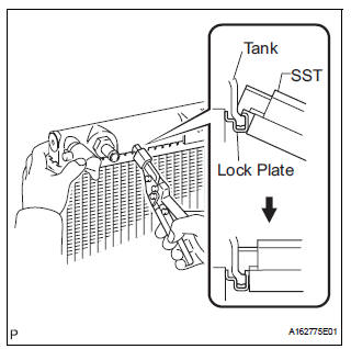 REMOVE LOWER RADIATOR TANK