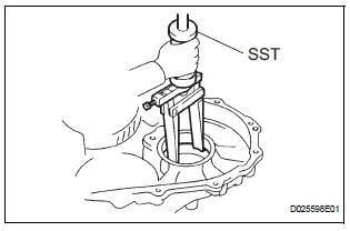 REMOVE FRONT DIFFERENTIAL CASE REAR TAPERED ROLLER BEARING