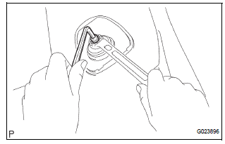 REMOVE SHOCK ABSORBER ASSEMBLY REAR LH