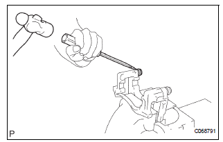 REMOVE FRONT DISC BRAKE BUSH DUST BOOT
