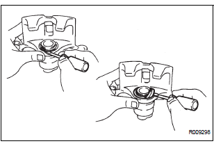 REMOVE FRONT DISC BRAKE PISTON