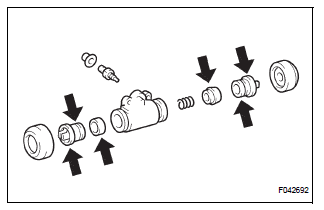INSTALL REAR WHEEL CYLINDER CUP KIT