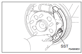 INSTALL FRONT BRAKE SHOE