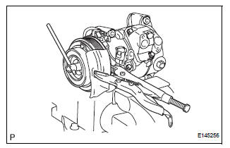 REMOVE MAGNETIC CLUTCH ASSEMBLY