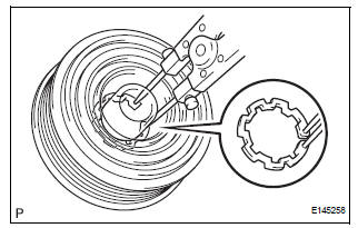 REMOVE MAGNETIC CLUTCH ASSEMBLY