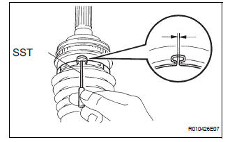 INSTALL REAR DRIVE SHAFT OUTBOARD JOINT BOOT CLAMP