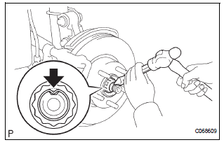 INSTALL FRONT AXLE HUB LH NUT